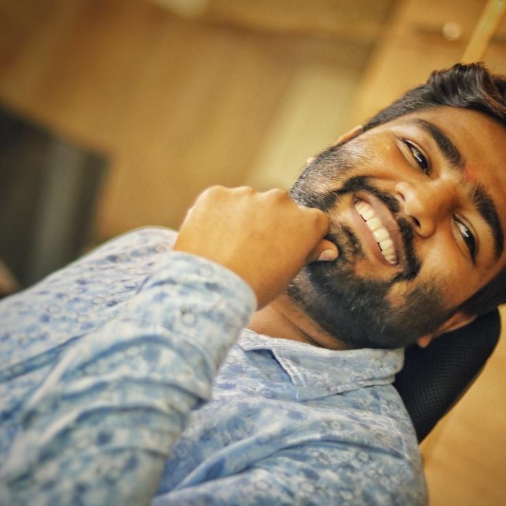 Kaveri Mehta, Lead Design Curator at Mirror Urban Season, reviewing corporate floral arrangements